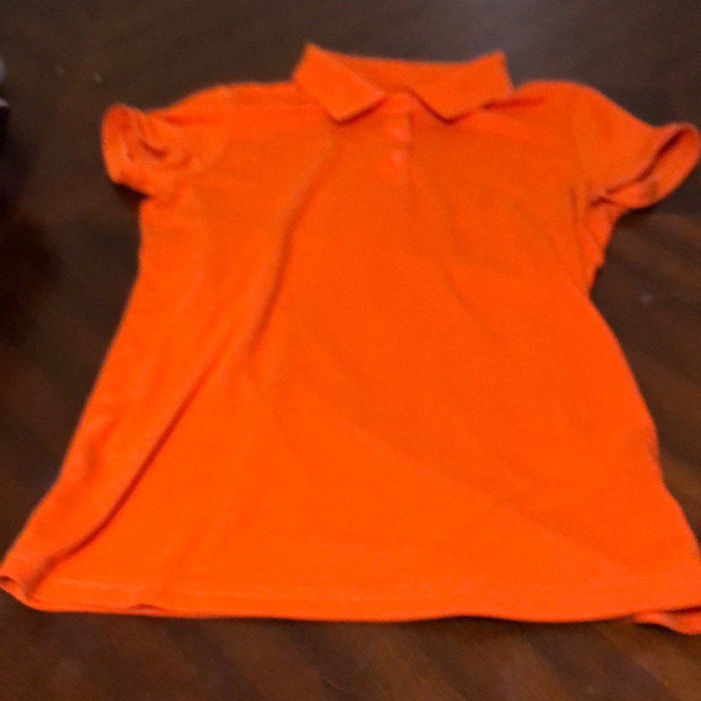 orange polo shirt